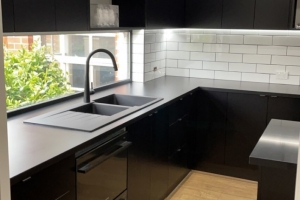 Matt Black Sink and White Subway Tiles